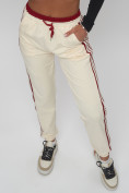 Купить Джоггеры спортивные трикотажные женские бежевого цвета 311B, фото 17
