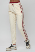 Купить Джоггеры спортивные трикотажные женские бежевого цвета 311B, фото 9