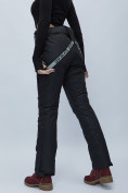 Купить Полукомбинезон брюки горнолыжные женские черного цвета 55221Ch, фото 9